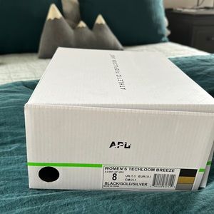 Nib APL techloom breeze shoes black gold silver